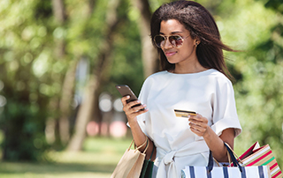 Research: Why Email is Essential for eCommerce | Email Marketing Platform | Everlytic | Blog feature image | Woman shopping online