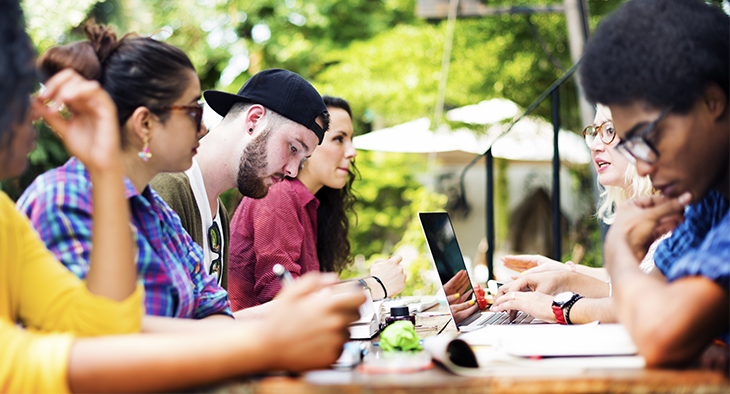 Digital Transformation & Student Engagement: Changing the Lives of South Africa’s Youth | Everlytic | Higher Education | Students around a table | Blog image