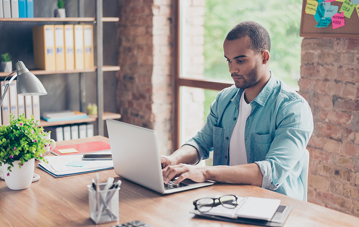 Everlytic-Blog-Why-Automate-Image-1 Six Reasons Why You Need to Automate Your Communications | Everlytic | Email Automation | Blog | Man working on laptop