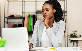 How to Prepare Your eCommerce Systems for Black Friday 2020 | Everlytic | eCommerce | Woman on laptop | Online retail | Blog feature image