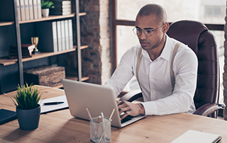 POPIA Q&A: Data Collection, Privacy & Storage | Data Collection | Man on Laptop | Feature image