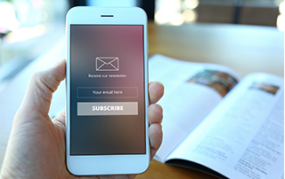 POPIA Q&A: Getting Consent for Direct Marketing | Hand with cell phone | Feature image
