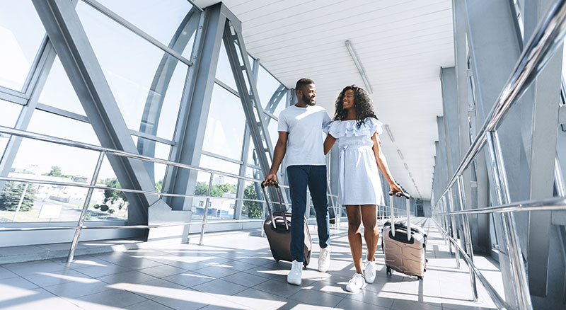 5 Email Marketing Tips for the Travel Industry | Everlytic Blog 5 Email Marketing Tips to Grow Your Travel Business Image 1 Everlytic Everlytic | Blog | 5 Email Marketing Tips for the Travel Industry | African Couple at Airport | Travel