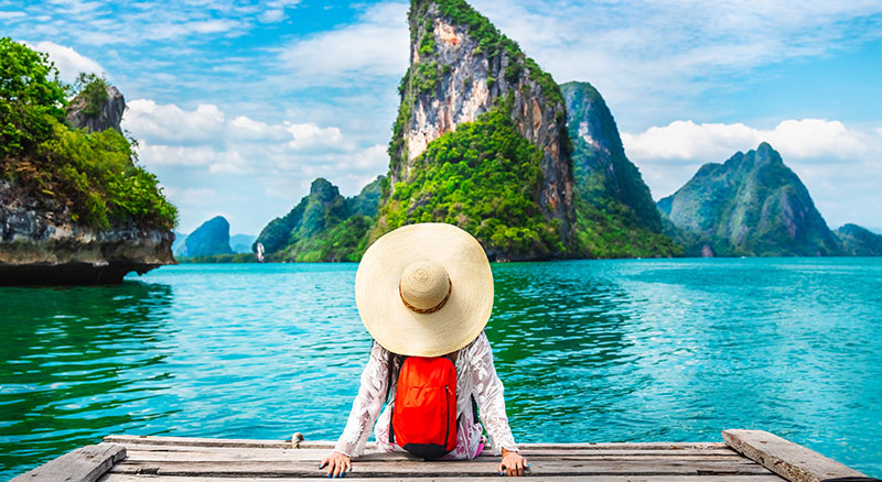 5 Email Marketing Tips for the Travel Industry | Everlytic Blog 5 Email Marketing Tips to Grow Your Travel Business Image 4 Everlytic Everlytic | Blog | 5 Email Marketing Tips for the Travel Industry | Woman Sitting Alone at an Exotic Destination| Travel