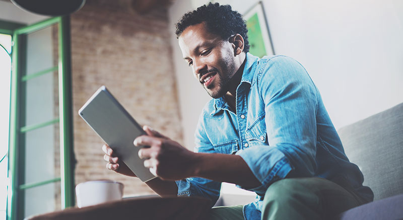3 Ways to Market to Your Audience Without Third-Party Cookies | Everlytic Blog Third Party Cookies Image 3 Everlytic Everlytic | Blog | 3 Ways to Market to Your Audience Without Third-Party Cookies | Mid-Aged Man Using a Tablet at Home