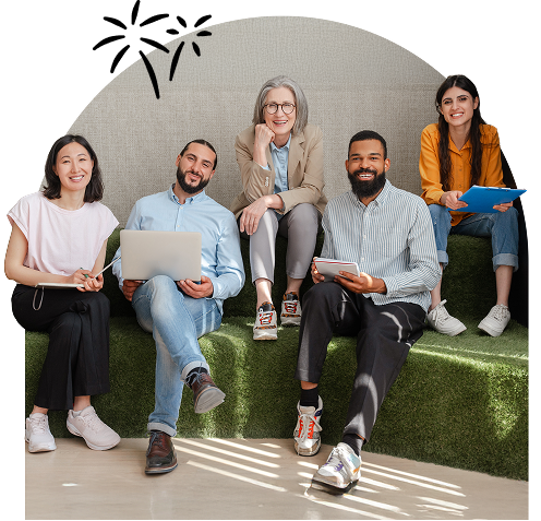 group of email marketing professionals smiling and sitting for a portrait